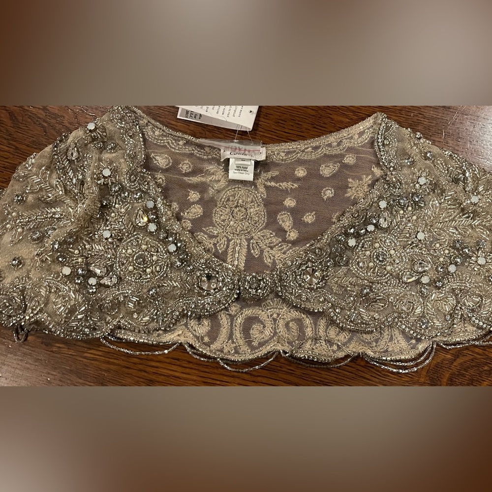 Stunning Moyna Couture beaded capelet/cape featuring beads and sequins.